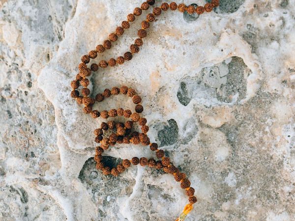 Person enjoying a beautiful sunrise with a sense of vitality.